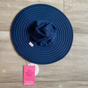 NWT RuffleButts Infant Navy Wide Brim Sun & Swim Hat with Chin Tie, 0-12 months